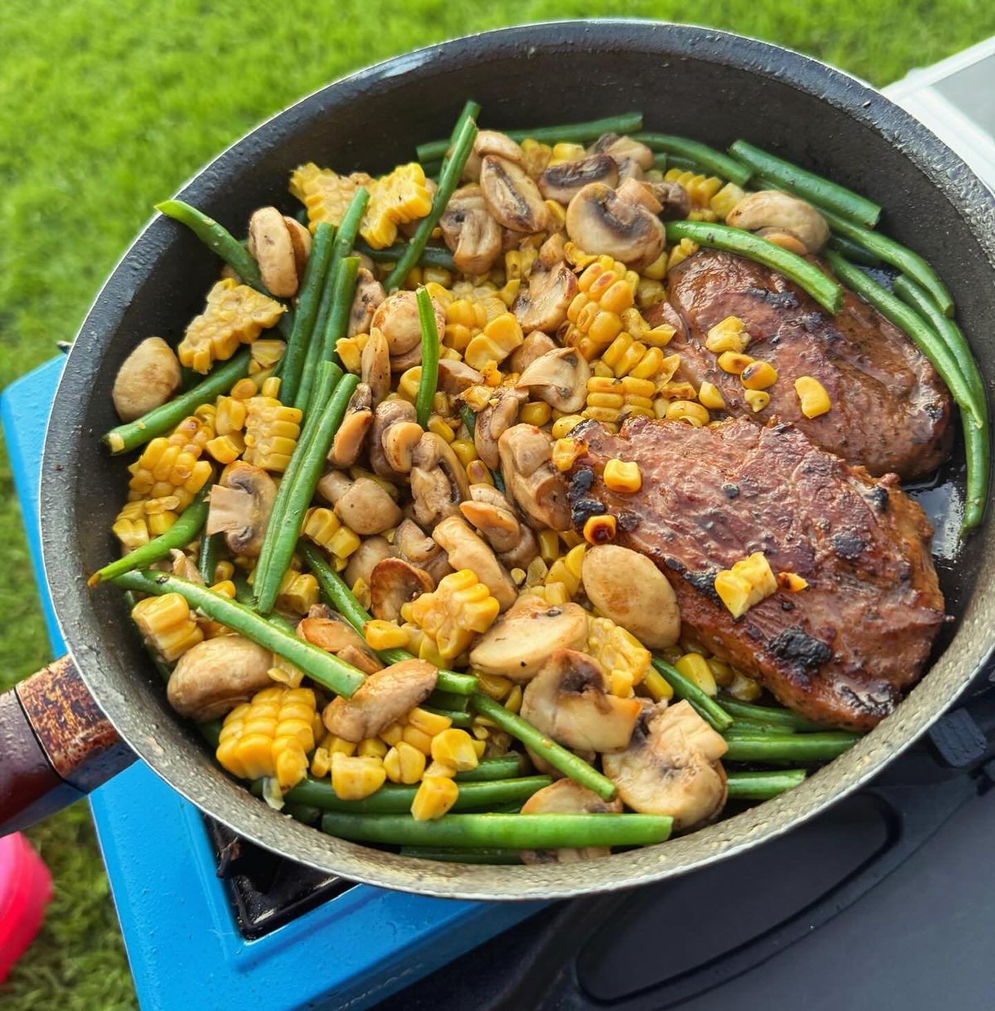 camping meal in pan on stove