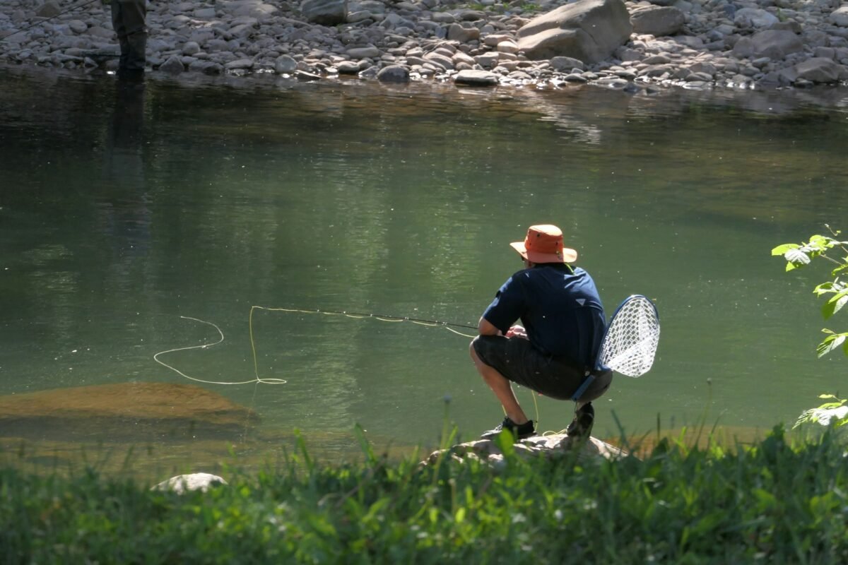 man fishing in the river