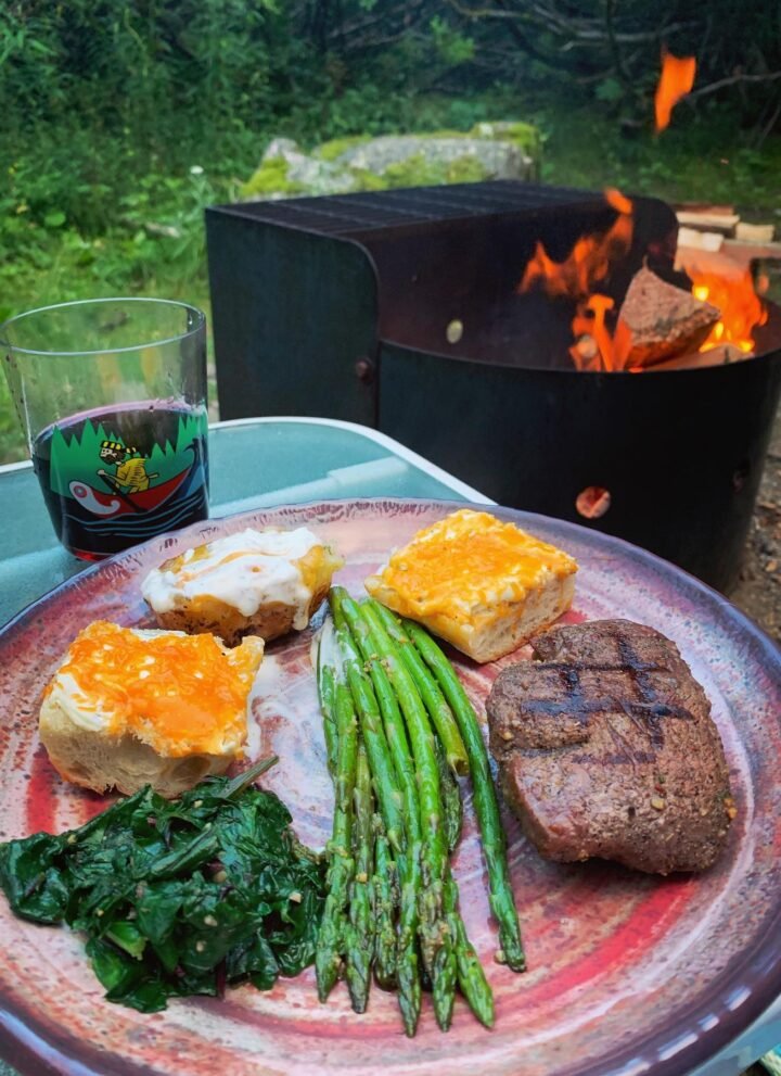 cooked food besides campfire
