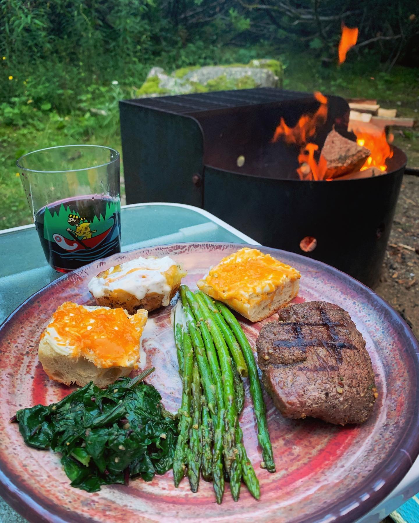 cooked food besides campfire