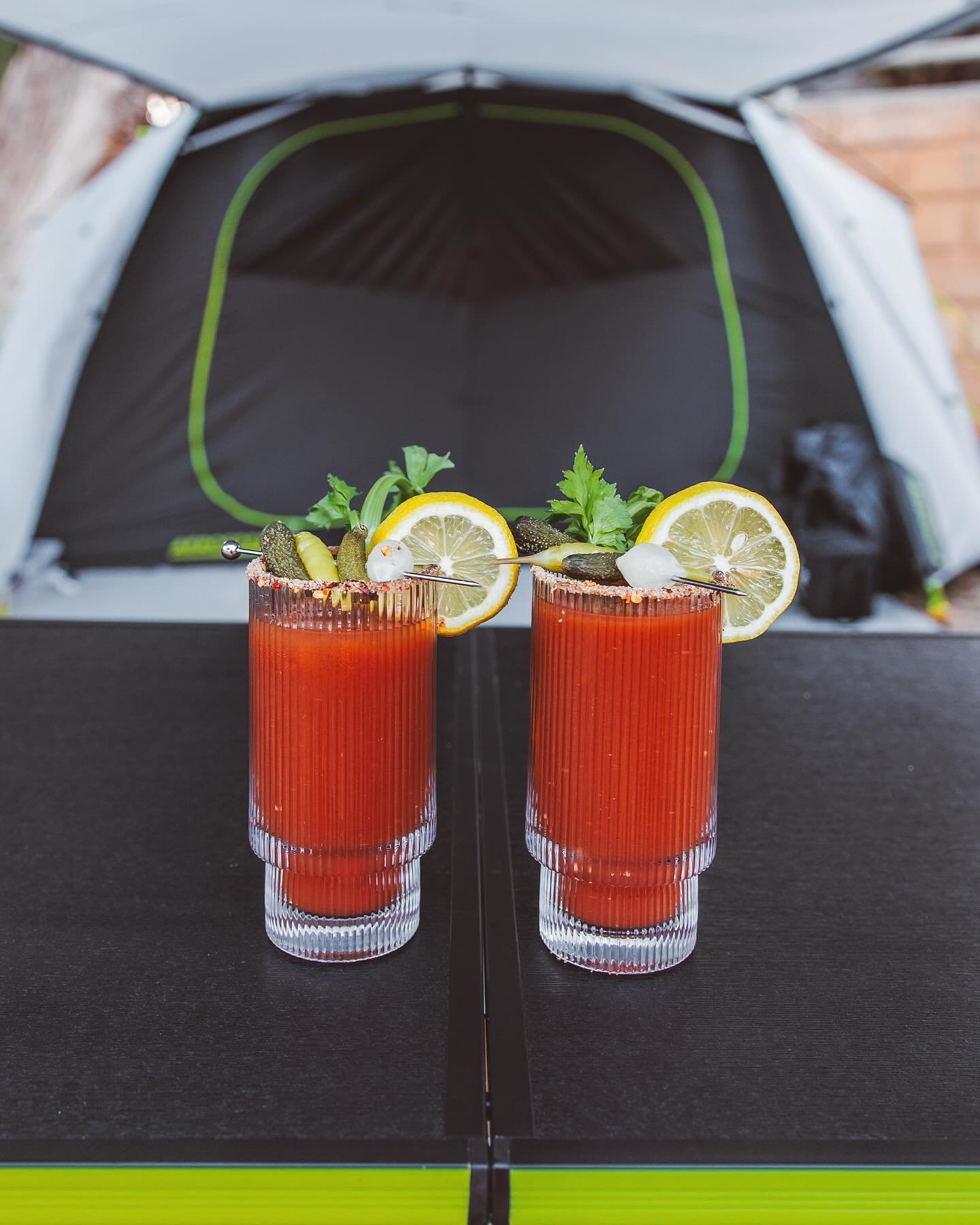 camping drinks under the tarp
