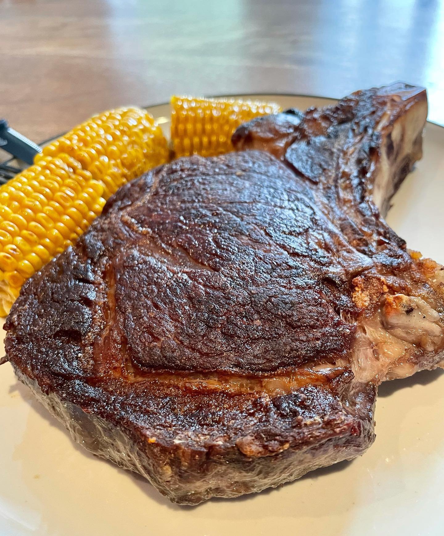 Campfire Steak and Fire Seared Corn on plate