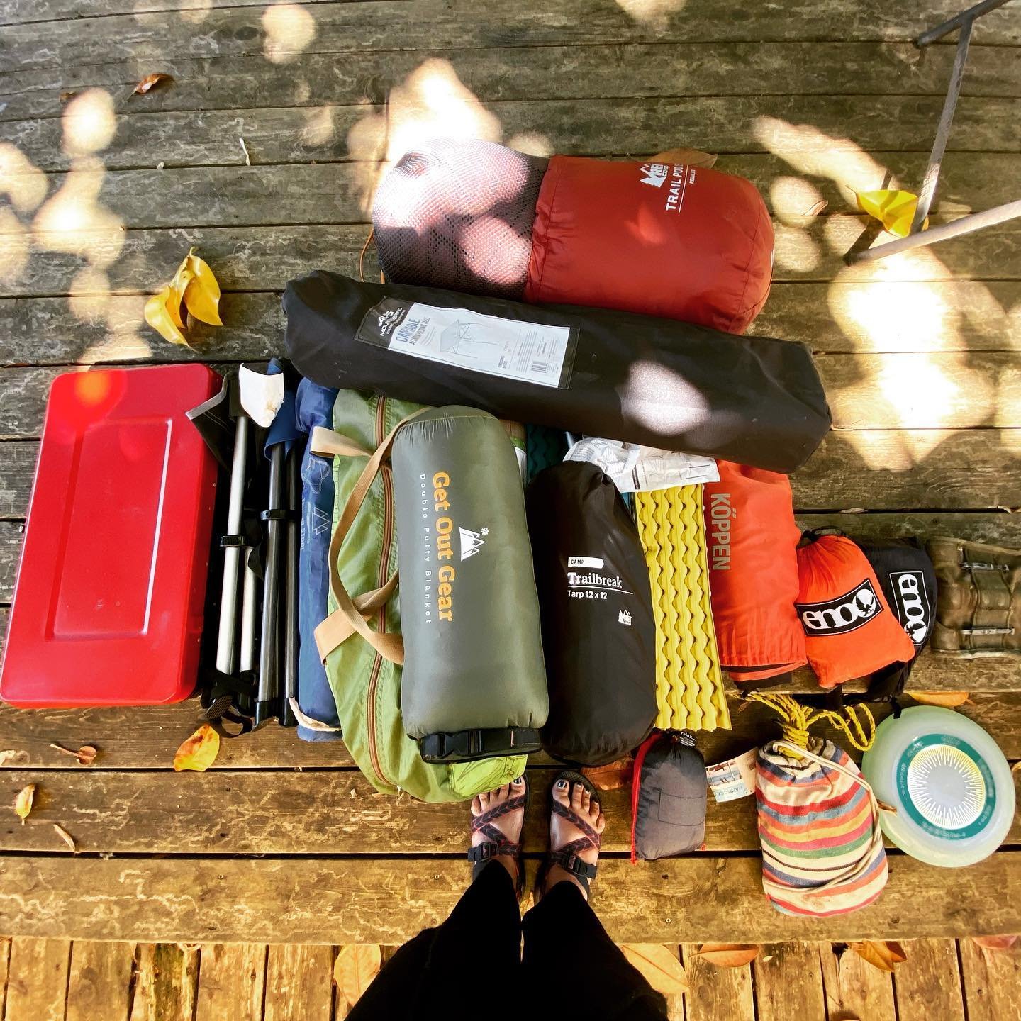 camping gears on feet