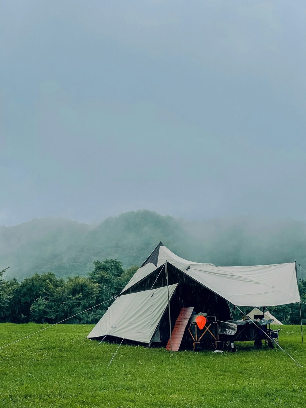 camping tent with tarp open